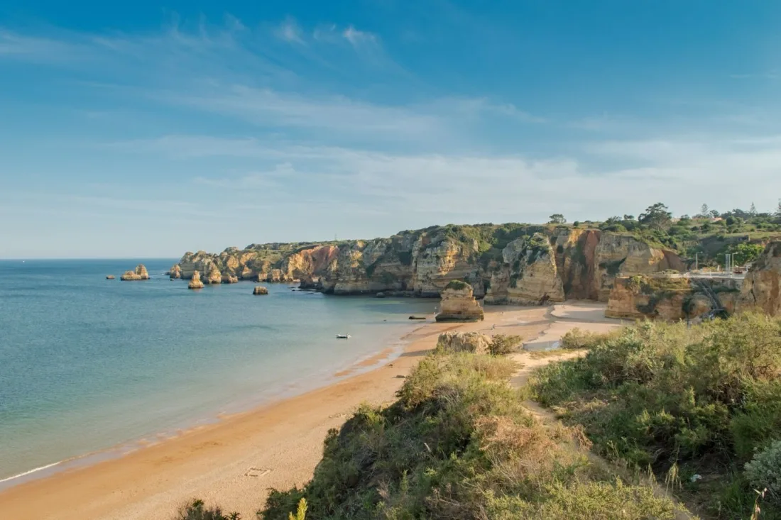 The golden cove and rock stacks of Praia Dona Ana near Lagos