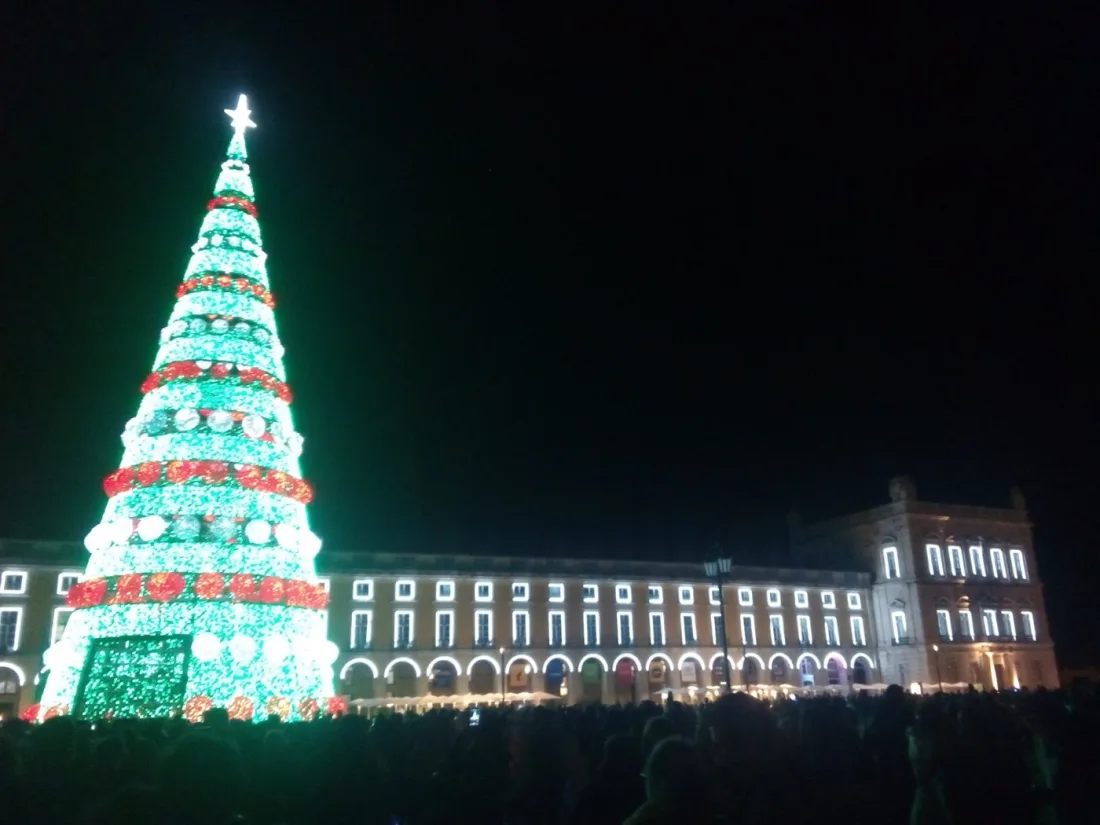 The giant illuminated Christmas tree on Praça do Comércio in Lisbon at night