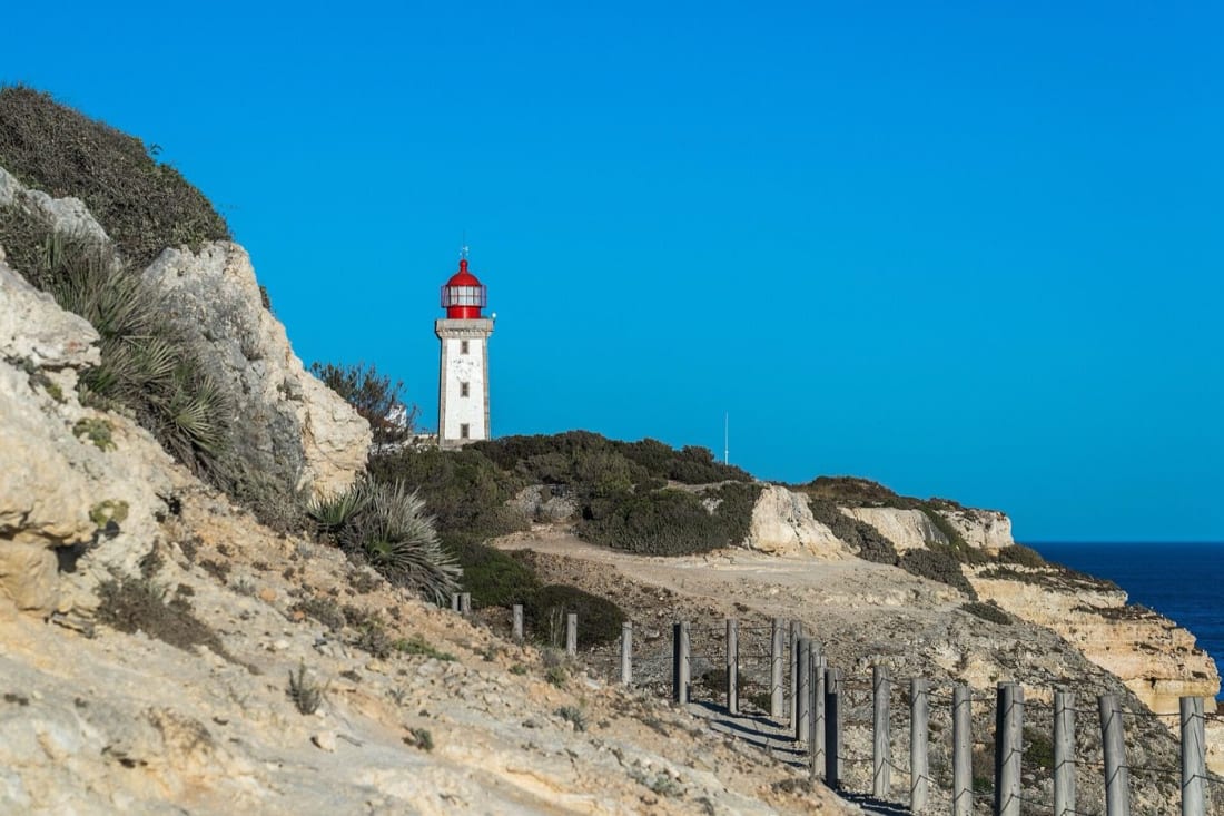 Alfanzina lighthouse above the clifftop path, Seven Hanging Valleys Trail