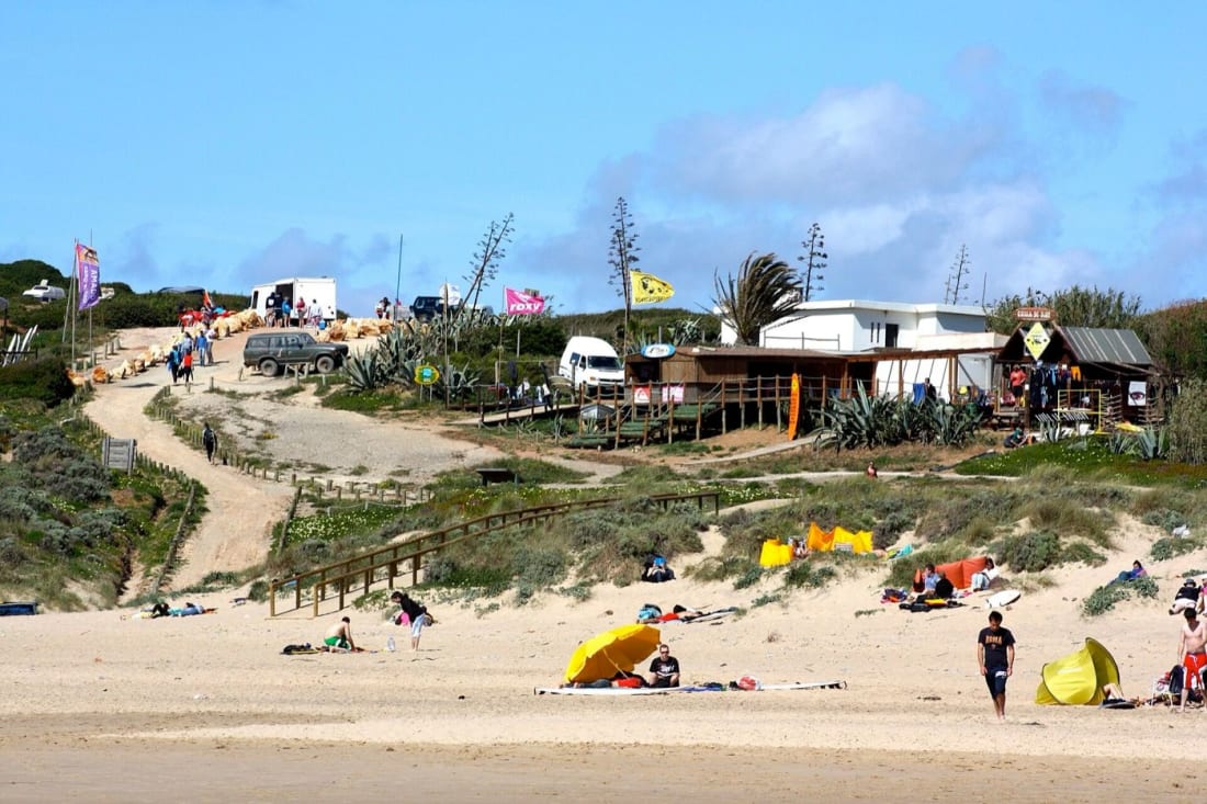Surf school lesson on the sand at Praia do Amado, Costa Vicentina