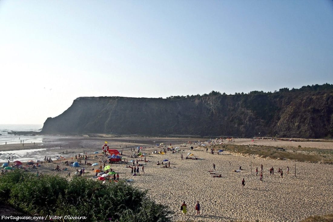 Praia de Odeceixe, where the Seixe river curves around the beach