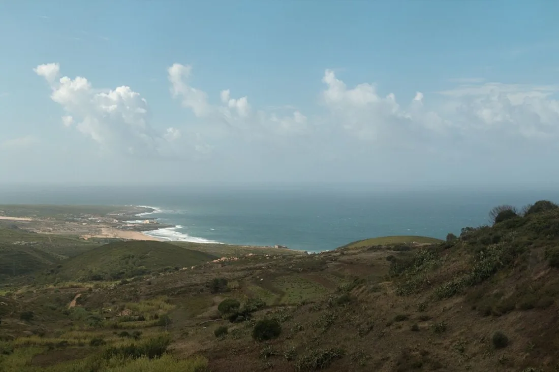 The Guincho bay seen from the hills, with the beach running north towards the headland